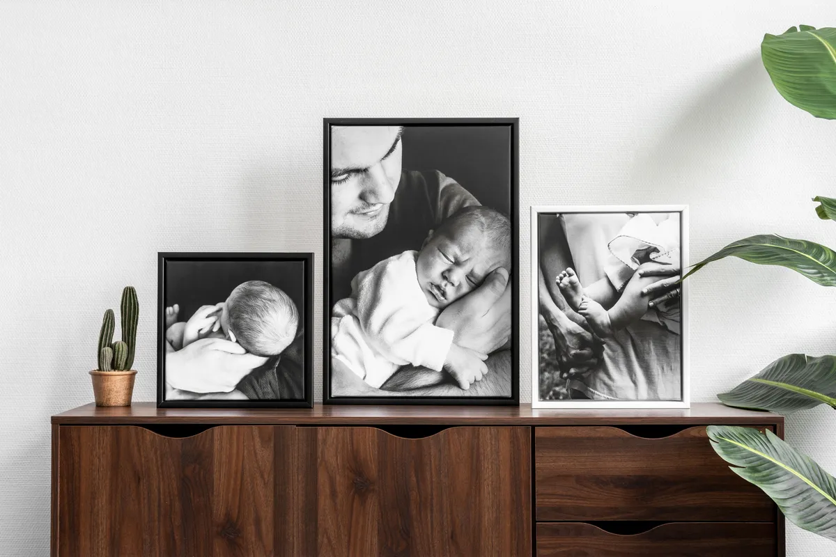 Fotoleinwand mit Rahmen. Familie. Baby